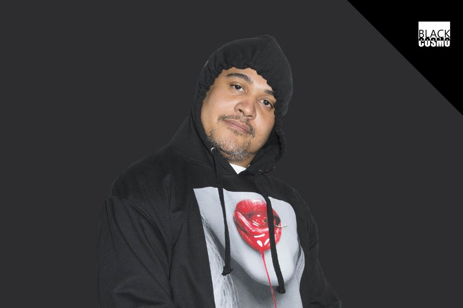 EXCLUSIVE: Murder Inc. Co-Founder Irv Gotti Reportedly “Declared Dead” at 54 Irv Gotti in a black suit at an industry event, appearing serious.