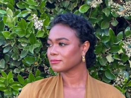 Tatyana Ali receiving an award at the LeadHer Awards in Canada, speaking on bias and trauma faced by women of color.