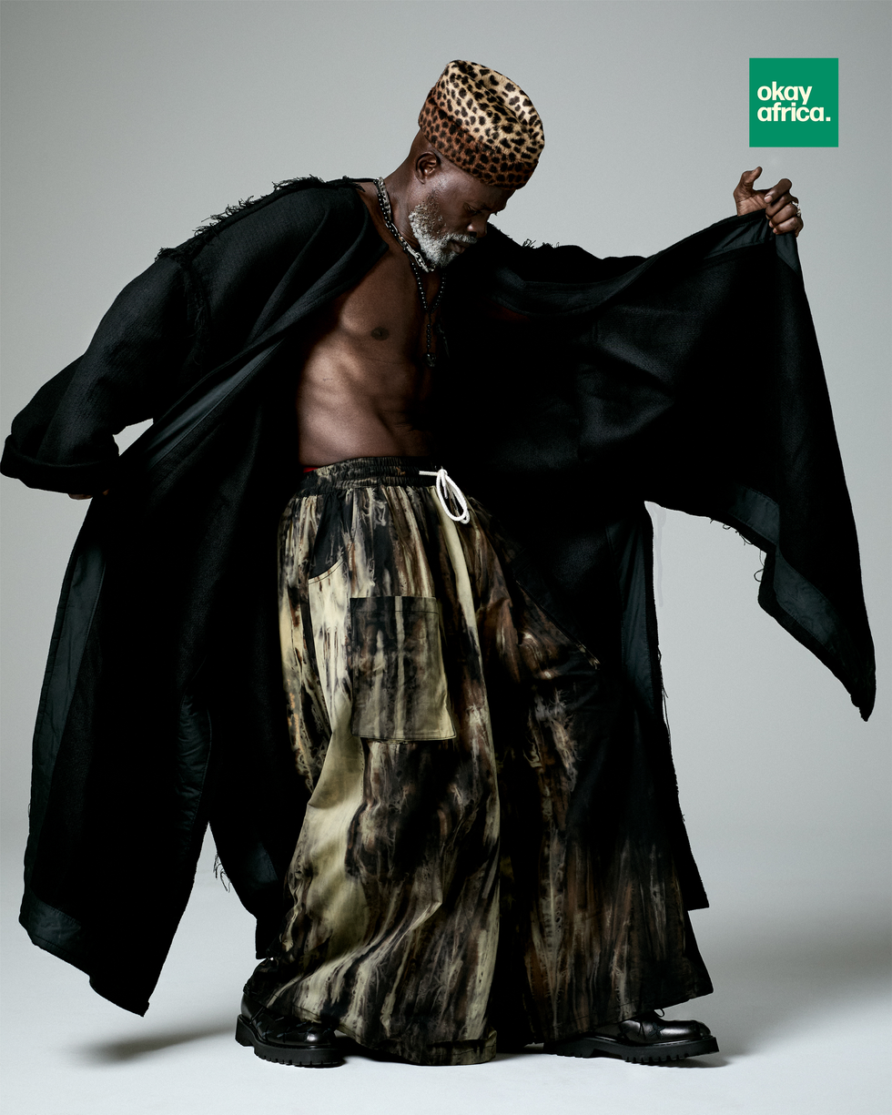Hat: Art Comes First | Coat: Art Comes First | Pants: Fried Rice | Jewelry: Art Comes First.
