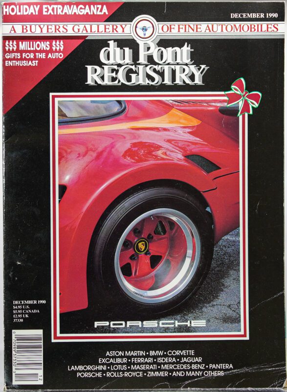 Close-up of a red Porsche sports car wheel on the December 1990 duPont REGISTRY cover, featuring Cover Cars, luxury car brands, and holiday gift suggestions.