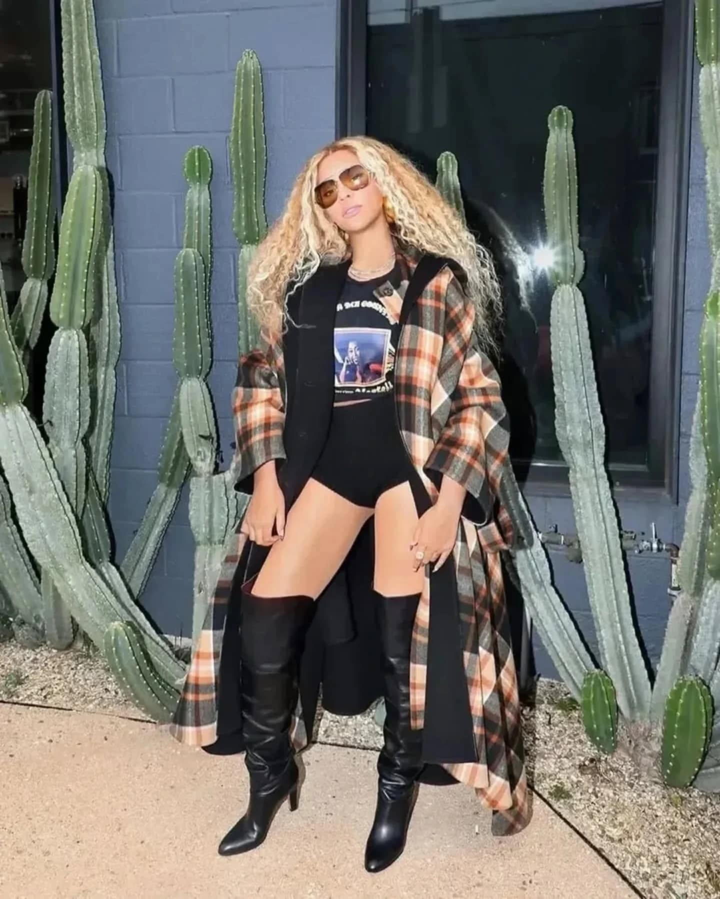 @beyonce posed in a $13,390 @chloe Oversized Plaid Wool Cape coat, a Linda Marte
