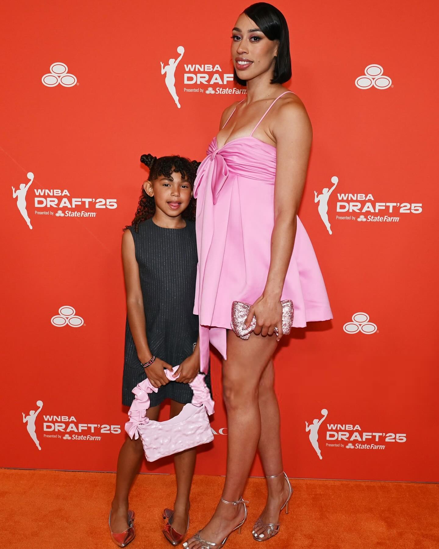 Dear Icamarie Wore Amur official at WNBA 2025 Draft with Daughter Amaya in Off White Dear Icamarie Wore Amur official at WNBA 2025 Draft with Daughter Amaya in Off White