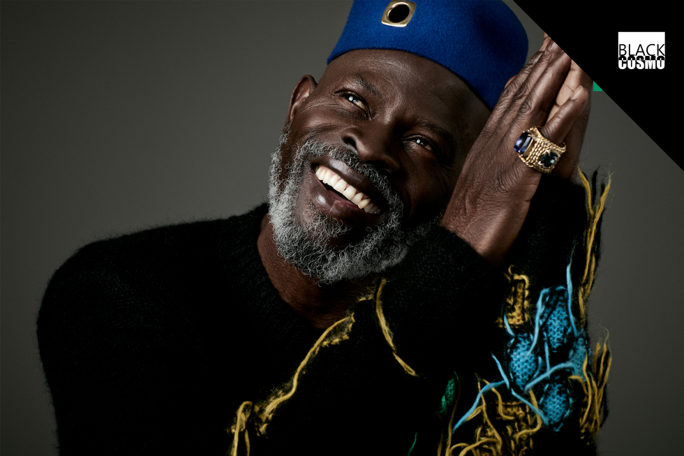 Djimon Hounsou: Hollywood’s Unsung Hero Sweater: ADSB Andersson Bell | Hat: Lu2019Enchanteur | Rings: Lu2019Enchanteur