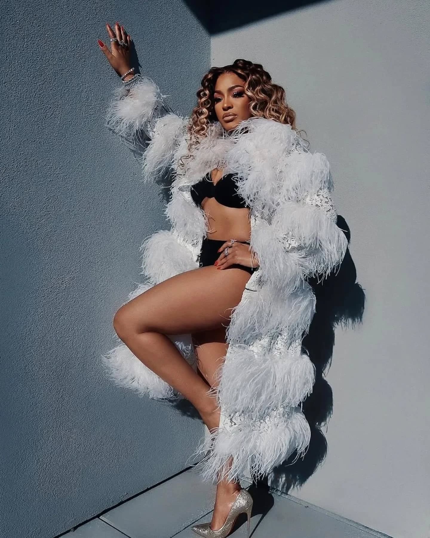 Drew Sidora Promotes New Single in Stylish White Feather Coat Drew Sidora Promotes New Single in Stylish White Feather Coat