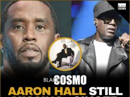 Aaron Hall performing on stage