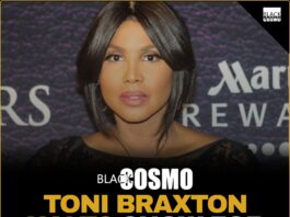 R&B icon Toni Braxton performing gracefully on stage.