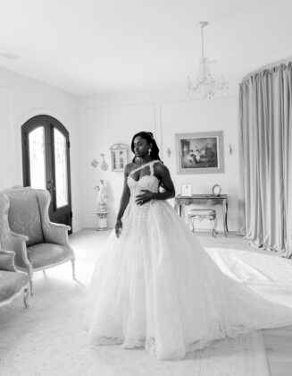 A beautiful wedding celebration showing Olympians Noah Lyles and Junelle Bromfield smiling together, representing the beautiful union of Jamaican and American cultures.