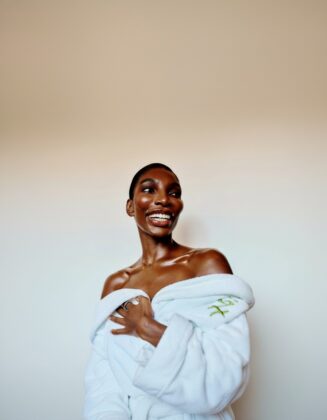 Michaela Coel commands attention in a fierce editorial look from her Harper's Bazaar March 2026 cover shoot.