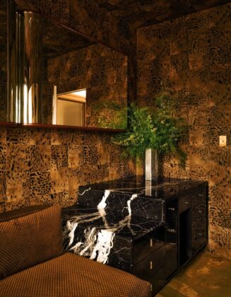 Interior designer Mark Grattan featured in an Architectural Digest spread, styled by Tiffani St., showcasing luxurious, sensual, and modern Black interior design.