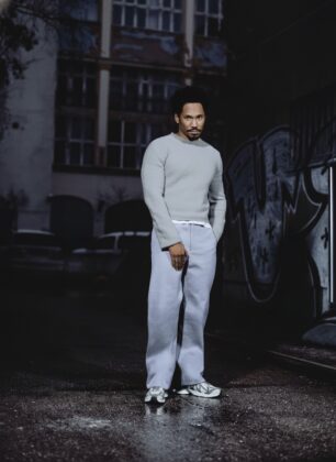 Grammy-winning producer Kaytranada posing for Highsnobiety, wearing avant-garde streetwear styled by Thevonfo, showcasing the intersection of Black culture and high fashion.