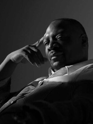 Adewale Akinnuoye-Agbaje looking sharp in a high-fashion editorial spread styled by Jason Rembert for Level Magazine.