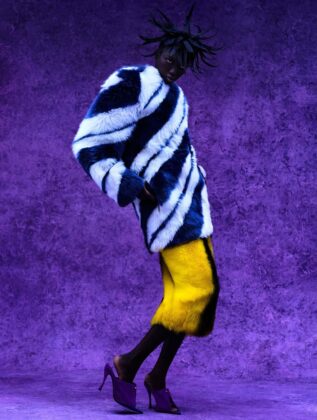 Anok Yai poses for British Vogue in an editorial shot by Rafael Pavarotti.