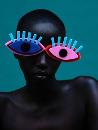Anok Yai poses for British Vogue in an editorial shot by Rafael Pavarotti.