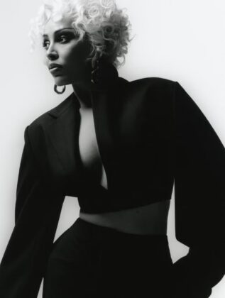 Doja Cat posing for the May 2026 cover of Elle UK in high-end fashion