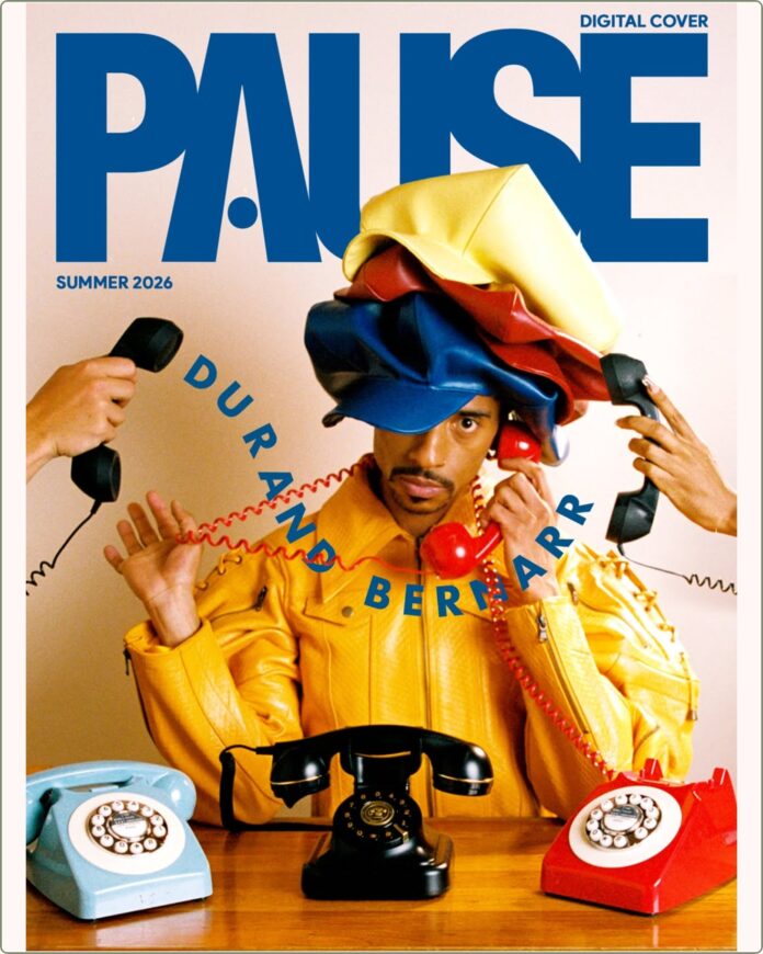 Durand Bernarr PAUSE Online June 2026 Cover Story Durand Bernarr posing in a muted lichen green setting with cellular beadwork accessories and textured plumage garments for PAUSE Online June 2026 cover.