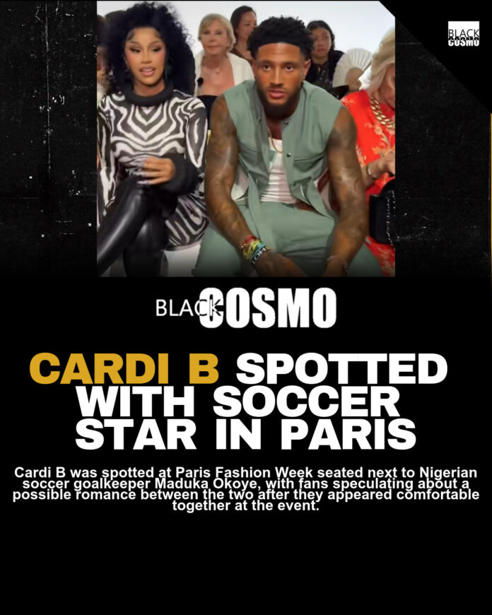 Nigerian Soccer Star Maduka Okoye Assists Cardi B During Paris Fashion Week Nigerian Soccer Star Maduka Okoye Assists Cardi B During Paris Fashion Week