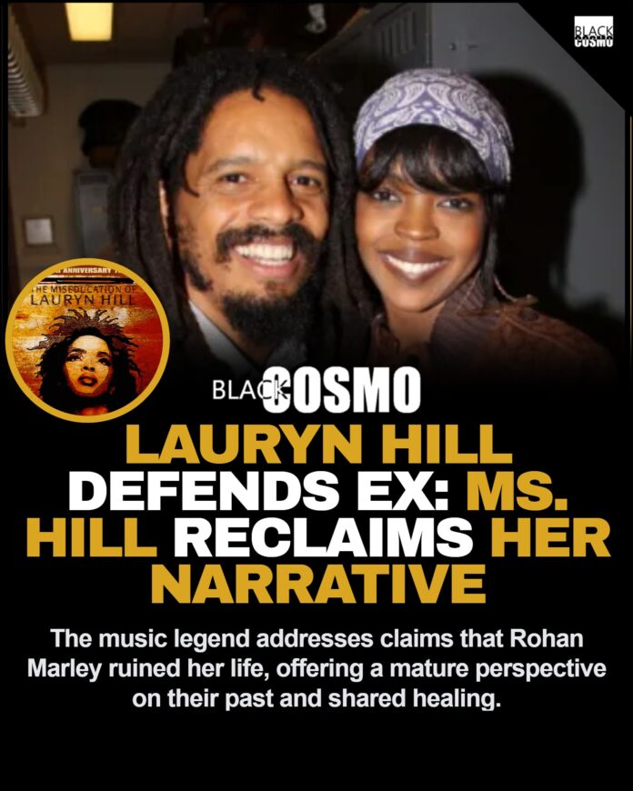 Lauryn Hill Shuts Down Rohan Marley Rumors | BlkCosmo Ms. Lauryn Hill performing onstage with a microphone, showcasing her grace and confidence.